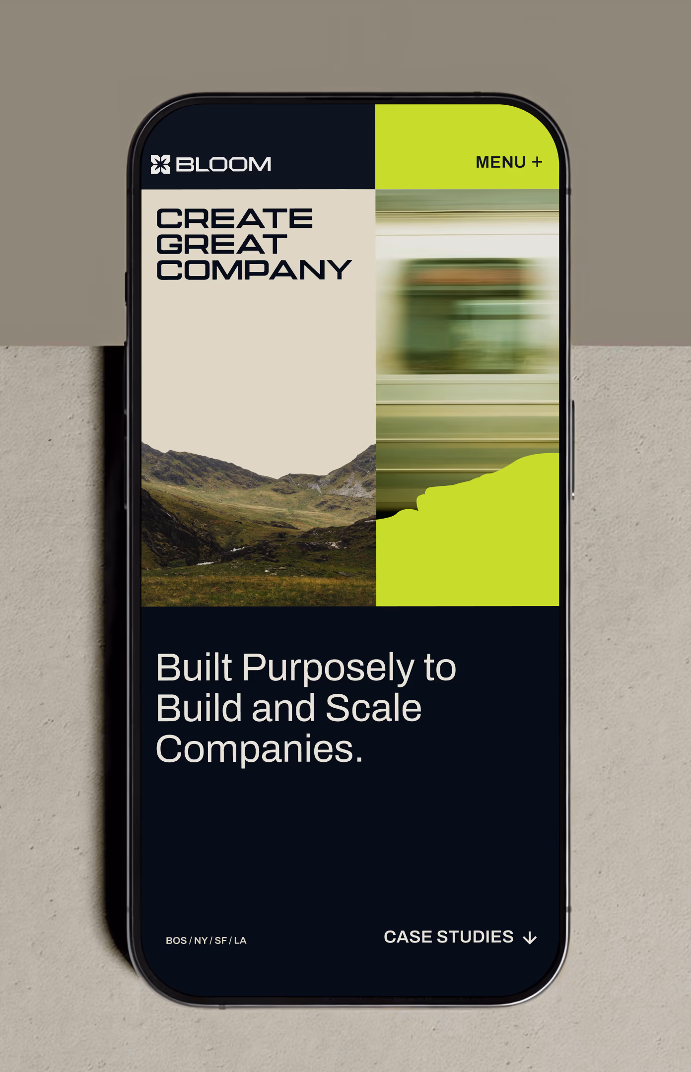 Bloom mobile site on a phone, the Create great company hero above the line Built purposely to build and scale companies