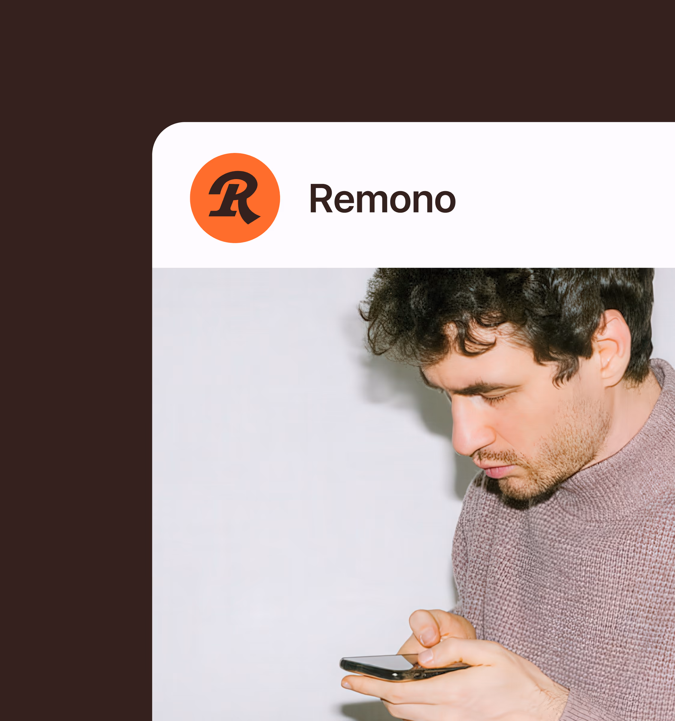 Remono app header with logo above a photo of a man checking his phone