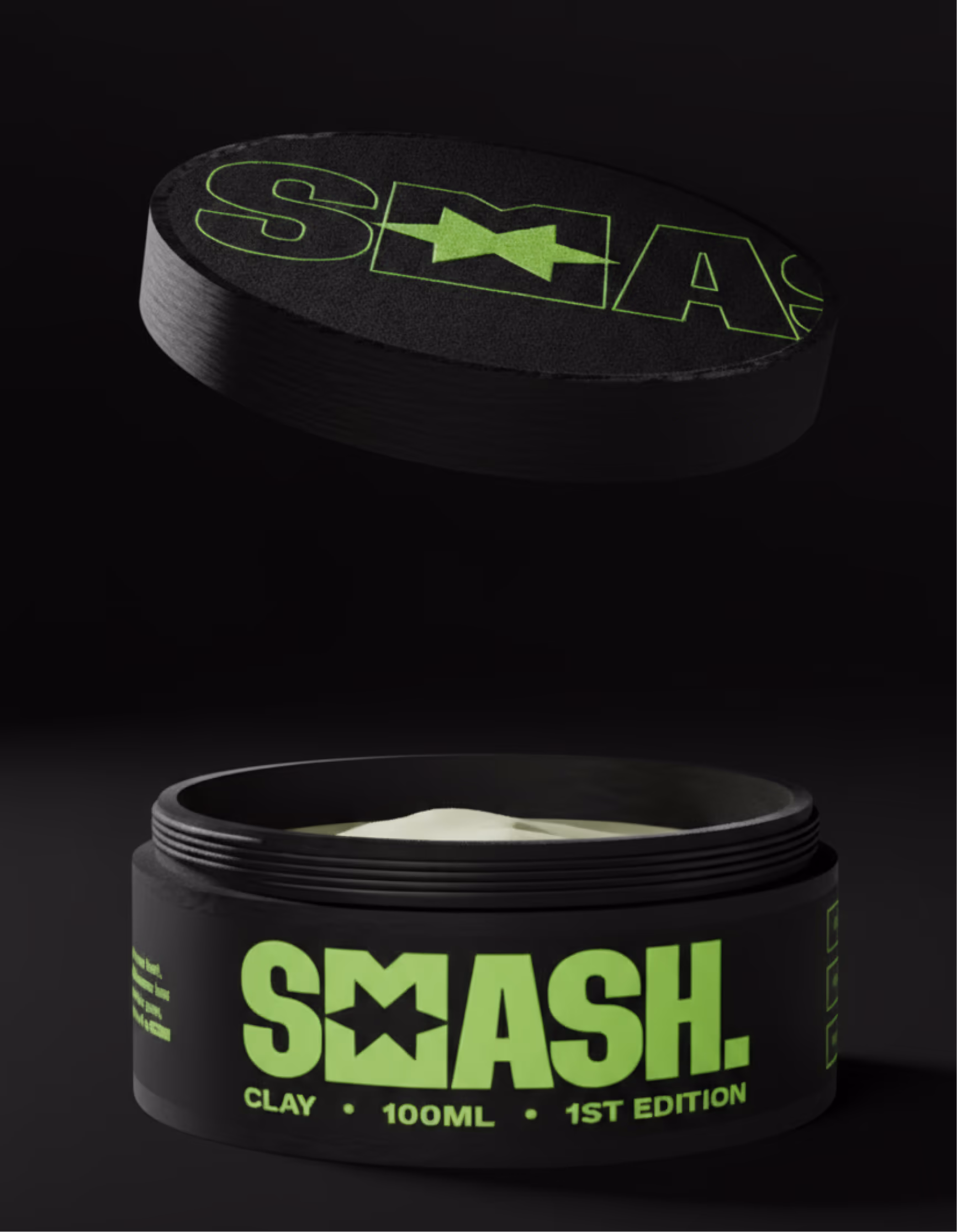 Open Smeash hair clay tin with lid lifted, green wordmark and Clay 100ml 1st Edition label